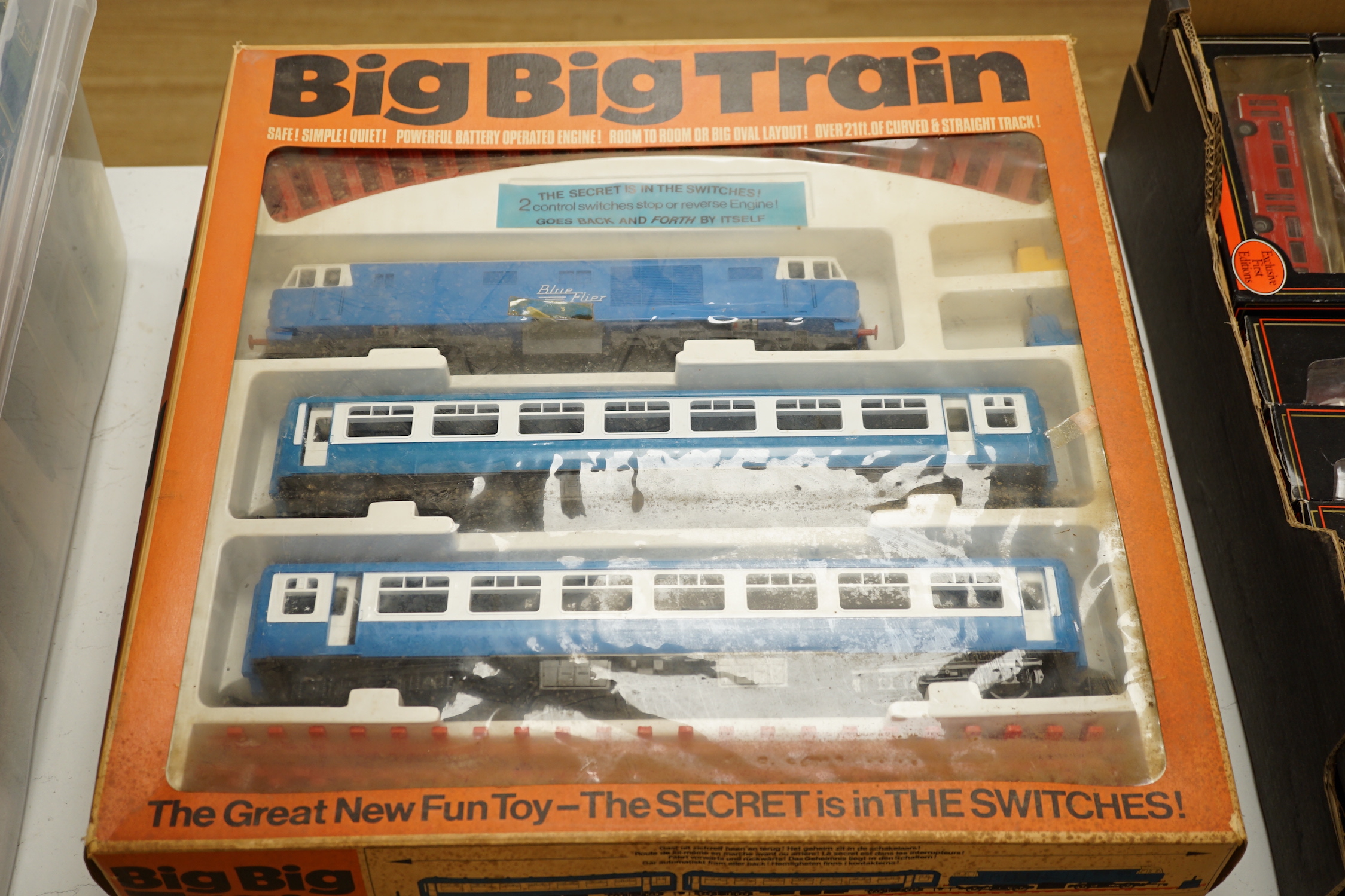 Three Tri-ang The Big Big Train 0 gauge train sets, all with a ‘Blue Flyer’ diesel locomotive and rolling stock, track sections, etc.